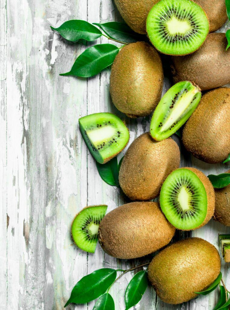 ripe kiwi with leaves